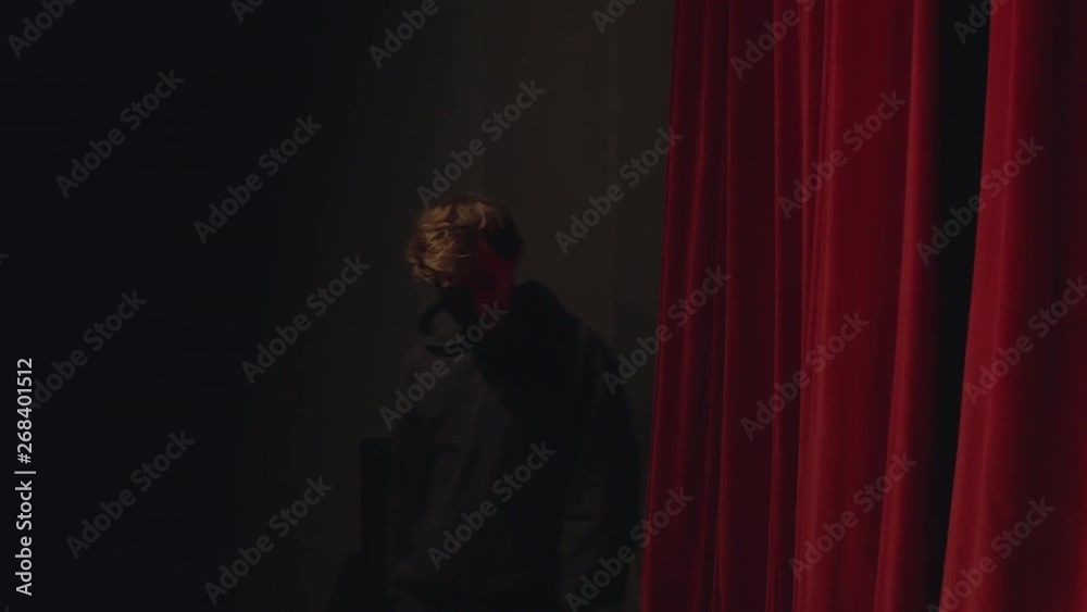 Actor in a theatre reviewing the script Actor in a theatre reviewing the script