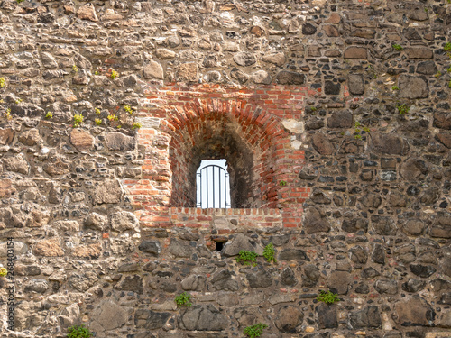 Section of wall with barred window at Carrickfergus Castle, Northern Ireland © Jim