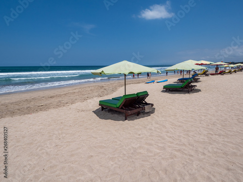 Bali, November 2019: Located on the western side of the island's narrow isthmus, Kuta Beach is Bali's most famous beach resort destination. Indonesia