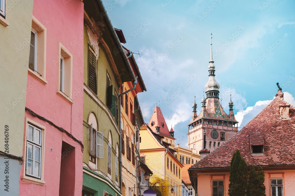 The centre of Sighisoara citadel with the Clock Tower and colorful houses