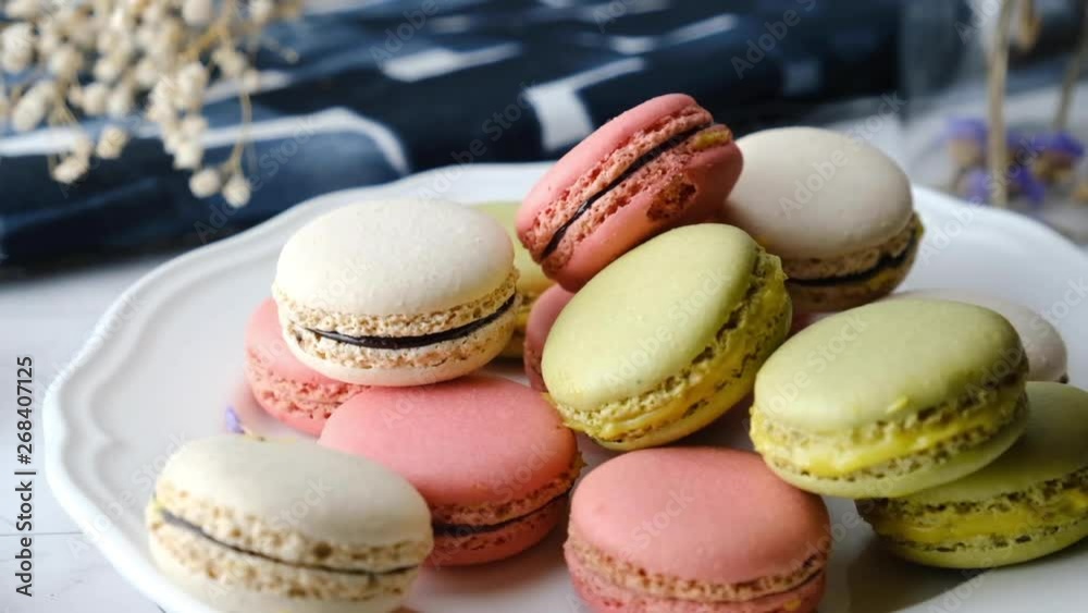 Colorful French macarons cakes desert set on party table. Colorful French macarons cakes desert set on party table.