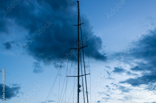 Yacht mast with the evening sky background - Image © Olena