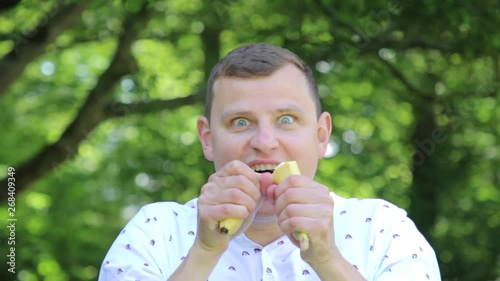 man breaks and eats banana fast and funny