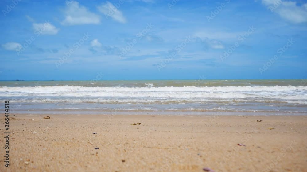Long beach with blue sky for natural background footage Long beach with blue sky for natural background footage
