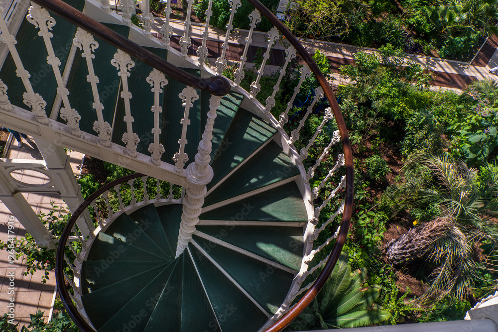A Spiral staircase in the flower garden
