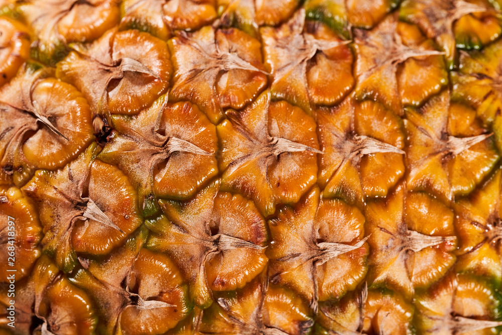 The surface of ripe pineapple shot close-up The surface of ripe pineapple shot close-up