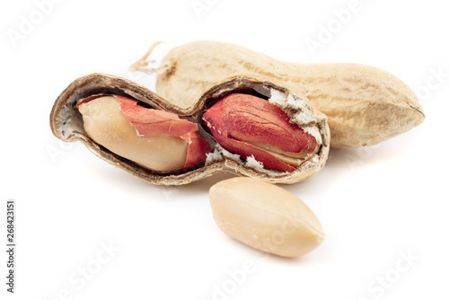 dried peanuts with shell on white background