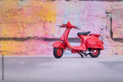 vintage scooter on colorful background