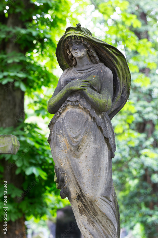 Historic Statue on the mystery old Prague Cemetery, Czech Republic Historic Statue on the mystery old Prague Cemetery, Czech Republic