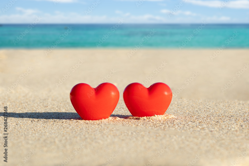 Two Red Heart Shape On Sand At Beach Two Red Heart Shape On Sand At Beach