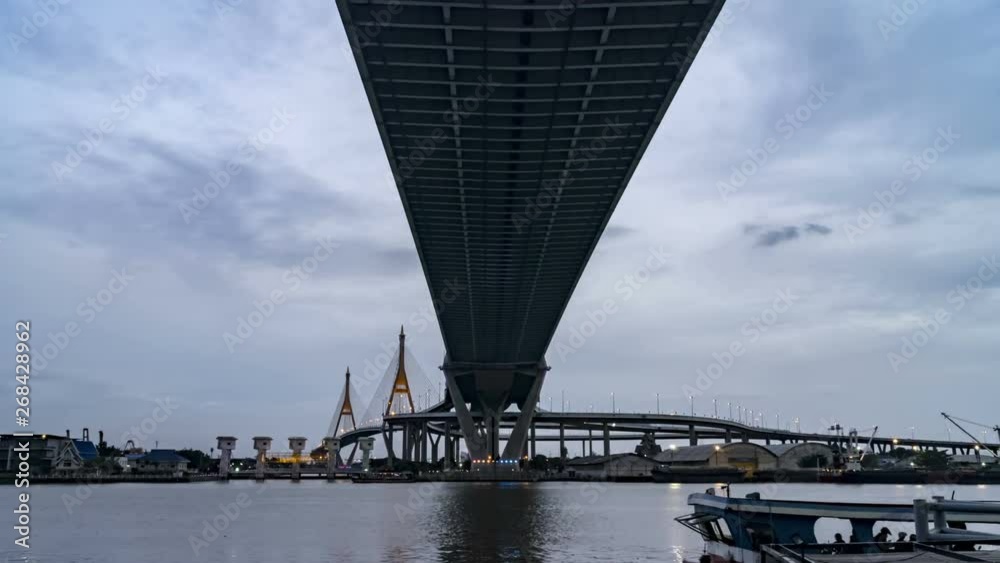 Bhumibol Bridge, Chao Phraya River Bridge Open many lights at night Crossing the ship to send the messenger across the Chao Phraya River Bhumibol Bridge, Chao Phraya River Bridge Open many lights at night Crossing the ship to send the messenger across the Chao Phraya River