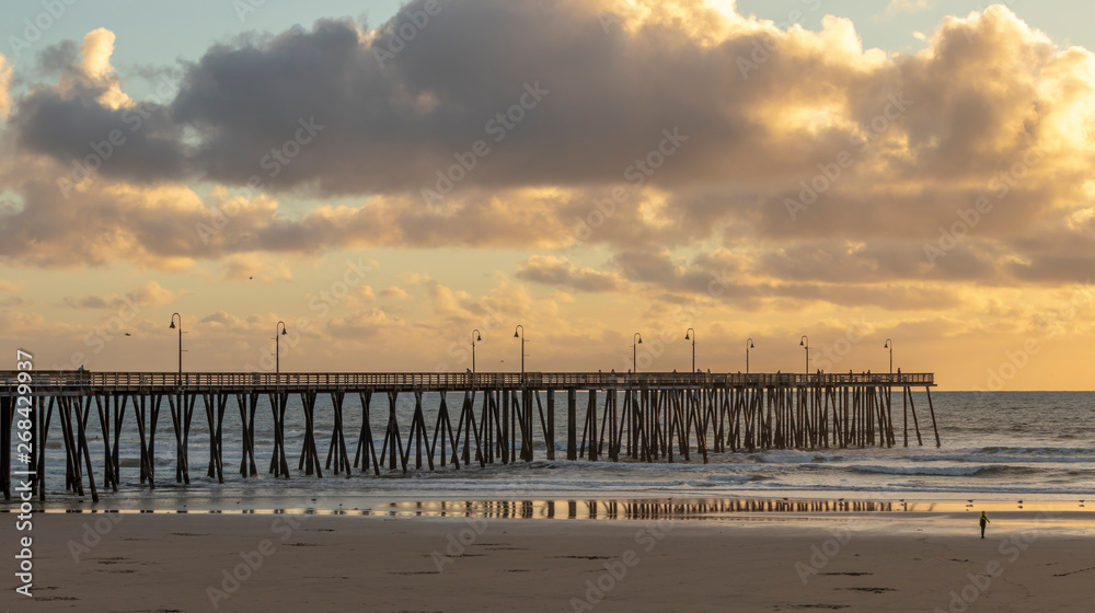 Pismo Beach Pier on a story winter afternoon, California, USA.