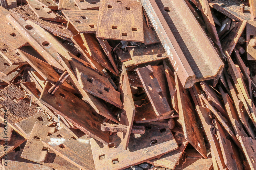 rusty metal pieces in a locomotive junk yard
