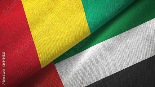 Guinea and United Arab Emirates two flags textile cloth, fabric texture
