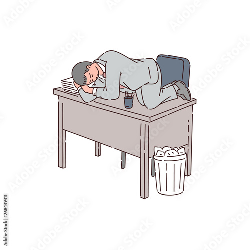 A tired man is an office worker or businessman sleeping on an office table because of insomnia.