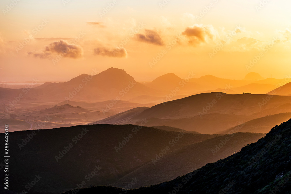 Layers of Mountains at Orange Sunset
