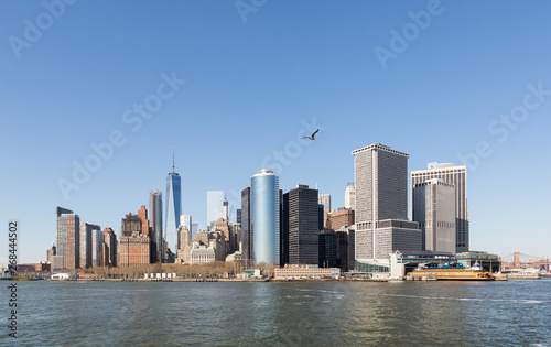 The skyline of New York City s Manhattan Island  and Hudson River from the Staten Island Ferry