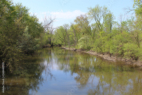 North Branch of the Chicago River on a sunny spring day at Blue Star Memorial Woods in Glenview, Illinois
