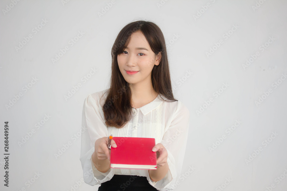 portrait of thai china adult office girl white shirt reading red book portrait of thai china adult office girl white shirt reading red book