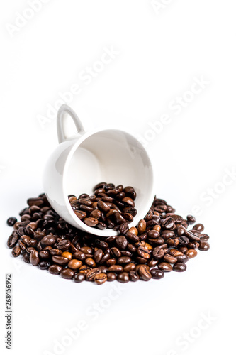 Cup with coffee bean on white