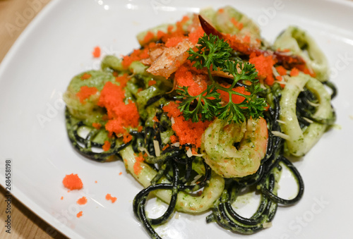 Spicy squid-ink spaghetti with seafood
