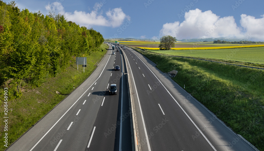Fototapeta premium Highway. Transport. Fields. Rural. Blue Sky