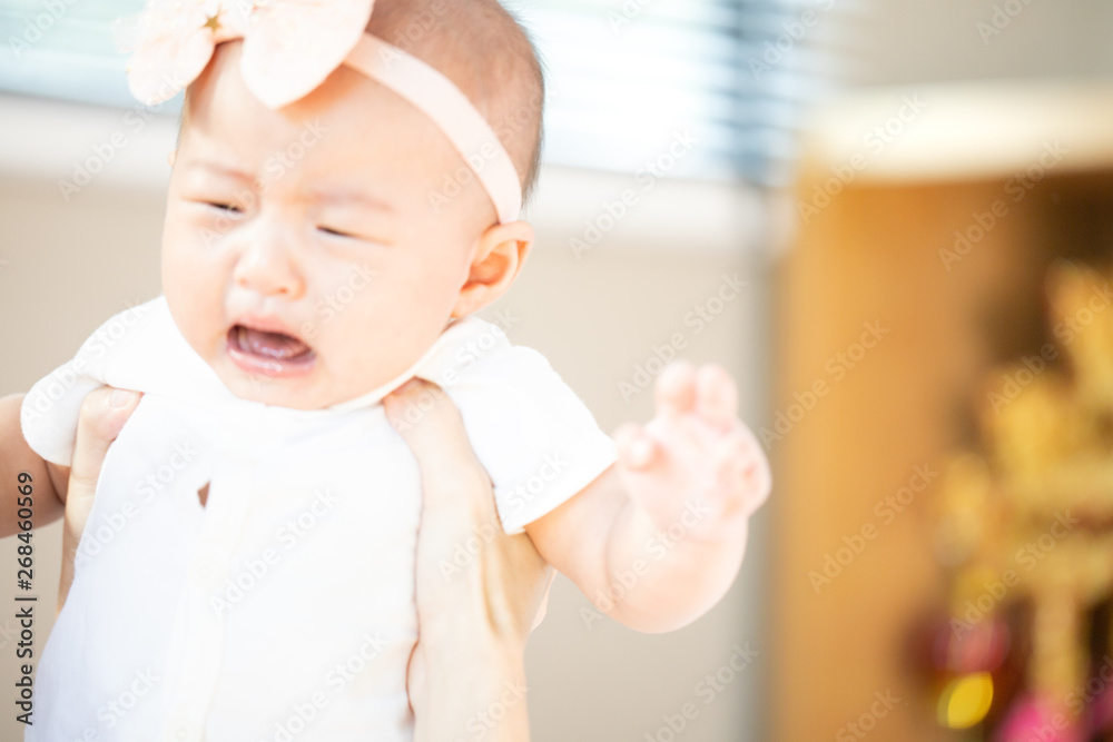 Asian baby happy in the room.Asian baby girl lying down on bed . Asian baby happy in the room.Asian baby girl lying down on bed .
