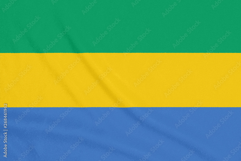 Fototapeta premium Flag of Gabon on textured fabric. Patriotic symbol