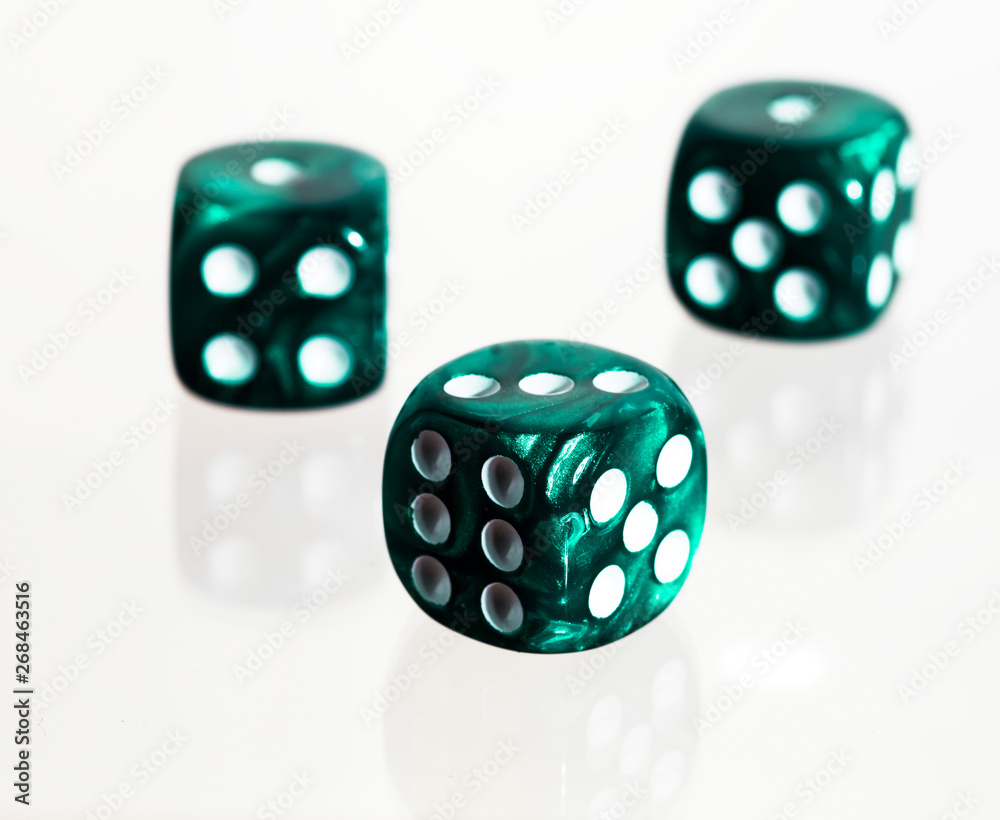 Three casino dice with white background