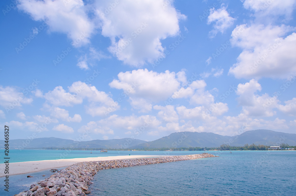 Beautiful seascape with stone brakwater on the beach. Beautiful seascape with stone brakwater on the beach.