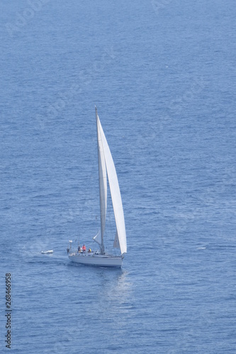 White sailboat in the Spanish sea.