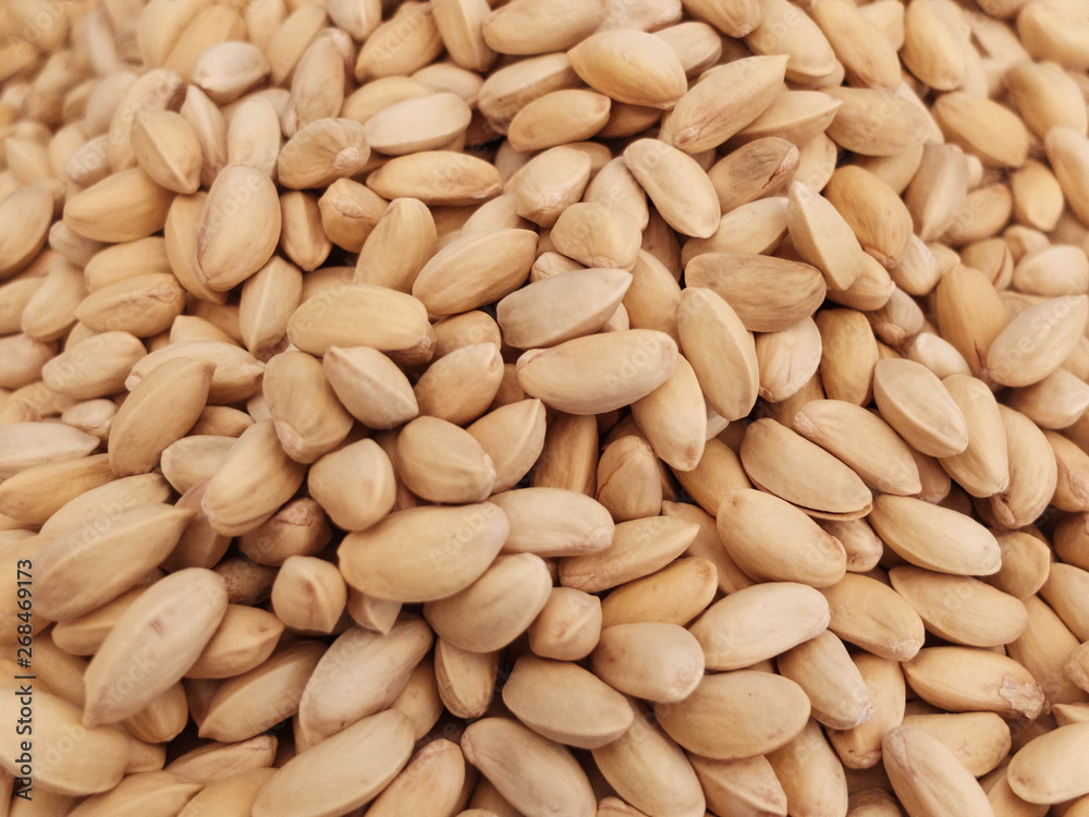 Raw pistachio nuts at the country market counter