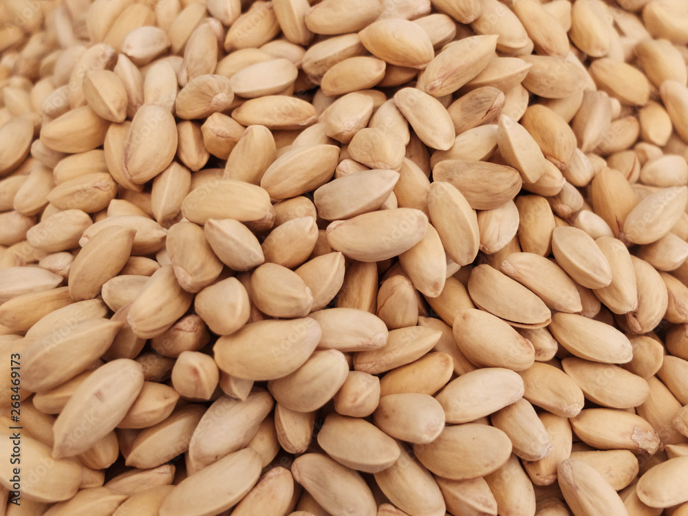 Raw pistachio nuts at the country market counter Raw pistachio nuts at the country market counter