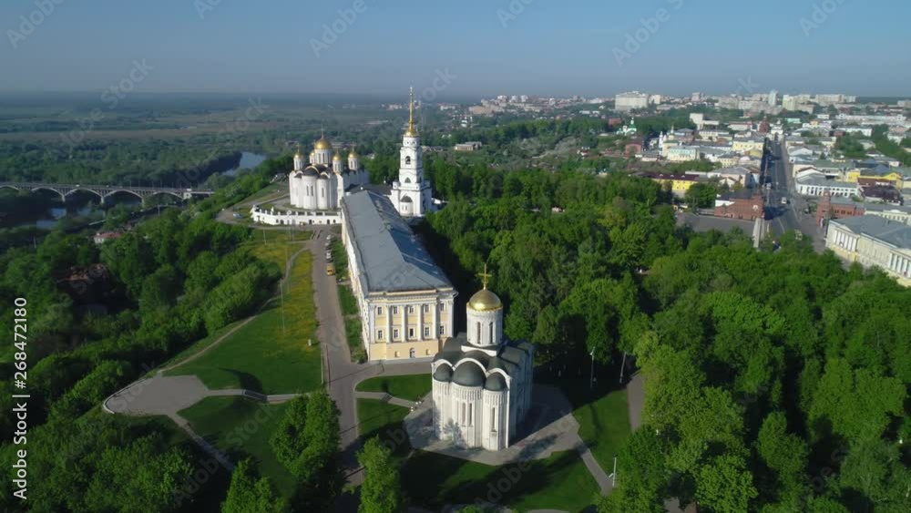Aerial panorama of the main tourist landmarks of Vladimir city: the Demetrius Cathedral, the building of the Vladimir provincial offices and the Assumption Cathedral. Aerial panorama of the main tourist landmarks of Vladimir city: the Demetrius Cathedral, the building of the Vladimir provincial offices and the Assumption Cathedral.