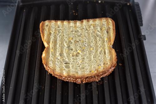 toastie with grilled marks on a grill close-up view