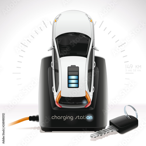 The white electric vehicle is charge at the black station of recharge as ordinary phone. Nearby the key from the electric vehicle lies. To recharge the electric vehicle battery also simply as phone.