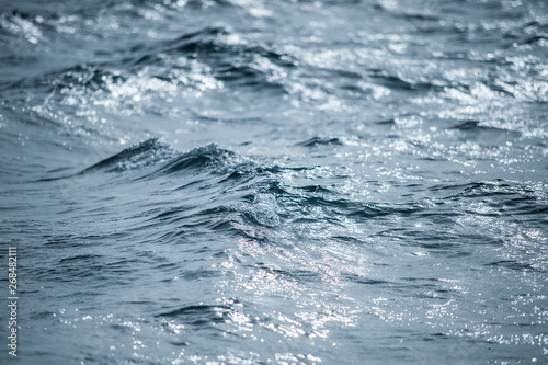 Small waves on the blue  open ocean.