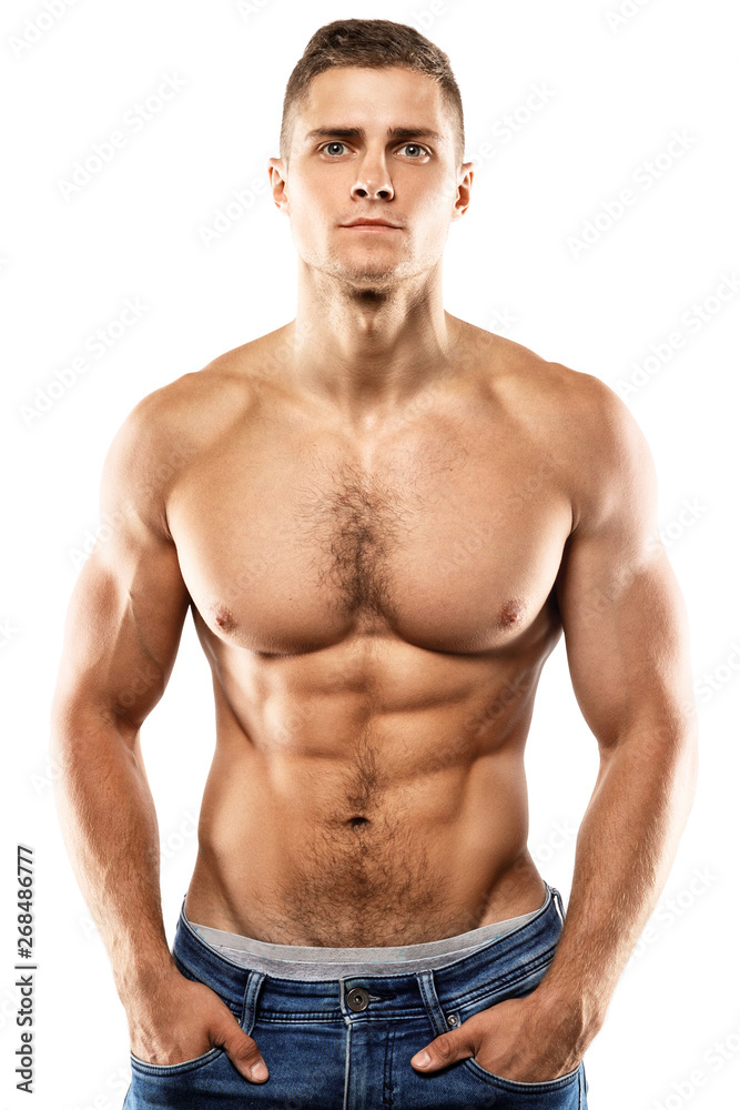 Handsome muscular guy is posing on white background Handsome muscular guy is posing on white background