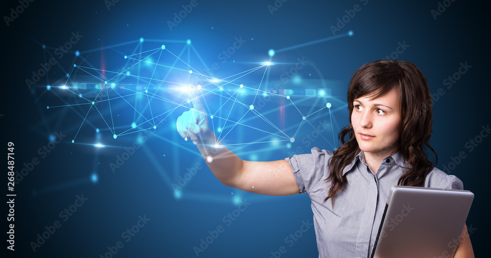 Woman touching hologram screen displaying modern web system
Woman touching hologram screen displaying modern web system