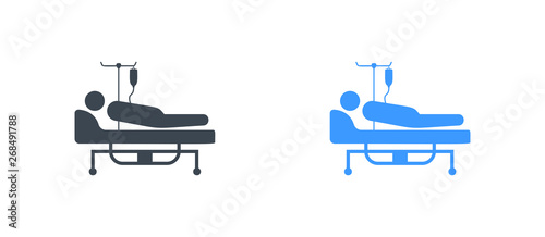 Patient in the hospital bed icon - Glyph vector sign