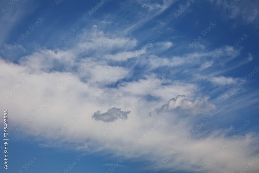 Blue sky with white cloud closeup background and texture