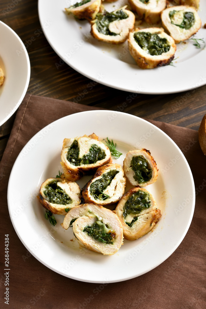 Cooked chicken fillet with spinach and cheese Cooked chicken fillet with spinach and cheese