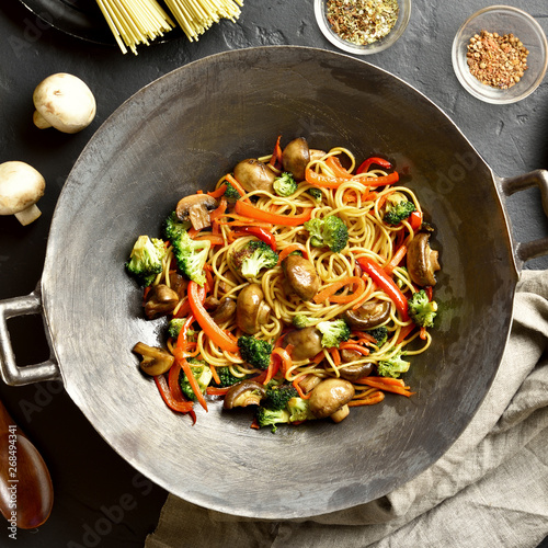 Stir-fry noodles with vegetables in wok