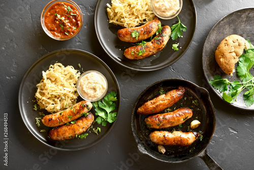 Grilled sausages with sauerkraut and horseradish