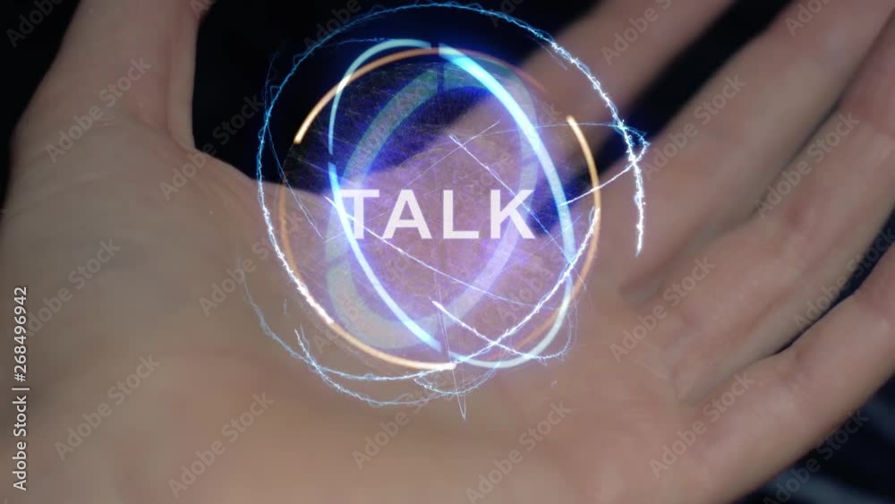 Talk text in a round conceptual hologram on a female hand. Close-up of a hand on a black background with future holographic technology Talk text in a round conceptual hologram on a female hand. Close-up of a hand on a black background with future holographic technology