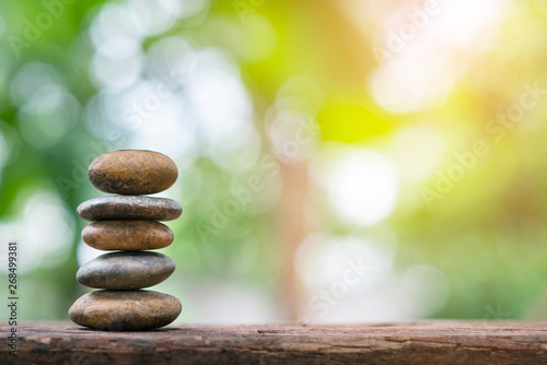 Banlance stones with spa on bokeh nature background