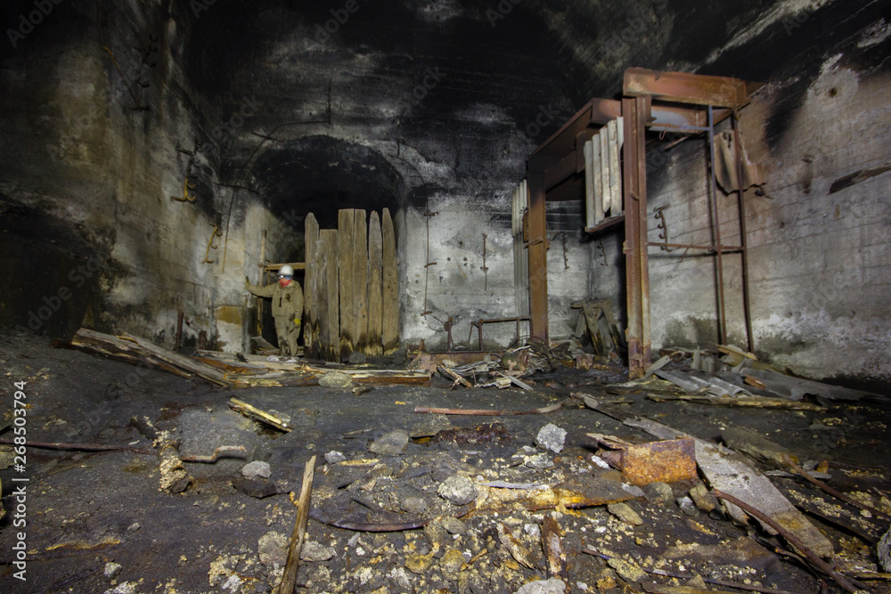 Fototapeta premium Underground mineshaft gold iron ore tunnel