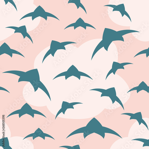 A flock of birds in the sky. Seamless pattern. Vector background