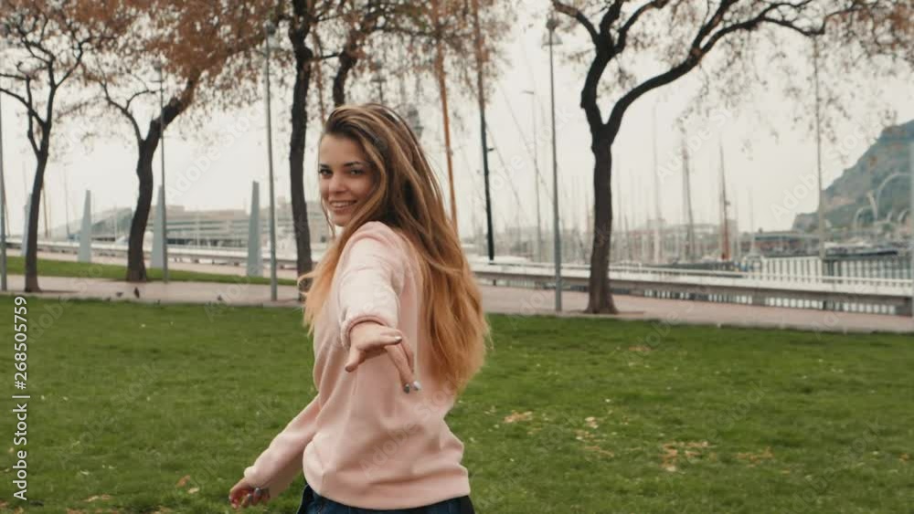 Happy student model enjoy sun day in university park, girl in campus smiling run and walking alone, portrait of spain woman in barcelona Happy student model enjoy sun day in university park, girl in campus smiling run and walking alone, portrait of spain woman in barcelona