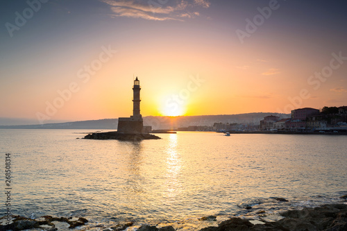 Lighthouse in the port of Chania at sunrise on Crete  Greece